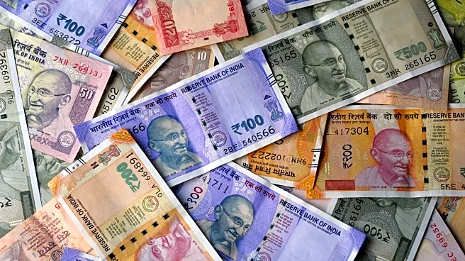 Rupee rebounds over 1% as RBI intervention, dollar unwinding lift sentiment