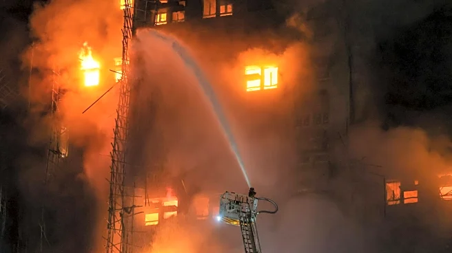 Hong Kong arrests three over deadly blaze, probes bamboo scaffolding