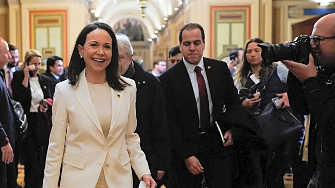 Trump accepts Nobel medal presented by Venezuela’s opposition leader Machado