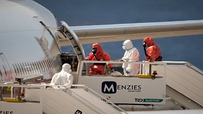 First plane carrying hantavirus cruise ship passengers leaves Tenerife for Madrid hospital