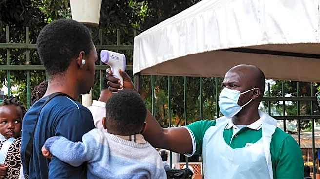 WHO declares Ebola emergency after 300 cases, spread reaches Uganda and Kinshasa