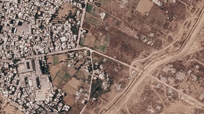 Israel is building a miles-long earthen barrier inside Gaza, entrenching its division