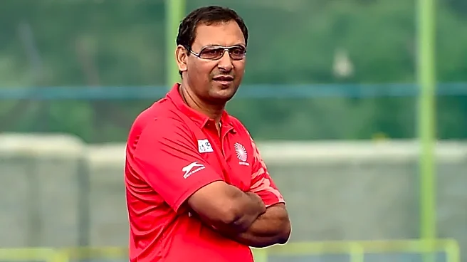 Why has Harendra Singh stepped down as India Women's Hockey Head Coach?