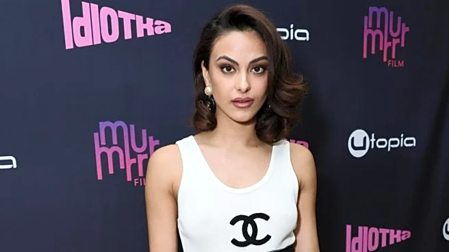 Camila Mendes Pairs Chanel Tank With Sheer Midi Skirt For New York Premiere Of ‘Idiotka’