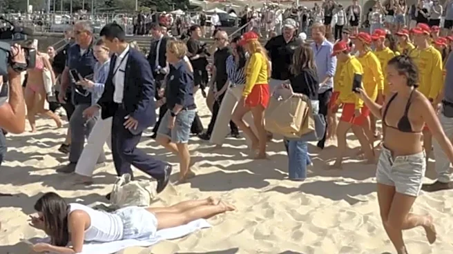 ‘Unbothered’ Beachgoer Goes Viral During Prince Harry, Meghan’s Australia Visit
