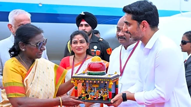 Nara Lokesh Presents 400-Year-Old Etikoppaka 'Sri Rama Pattabhishekam' To President Droupadi Murmu