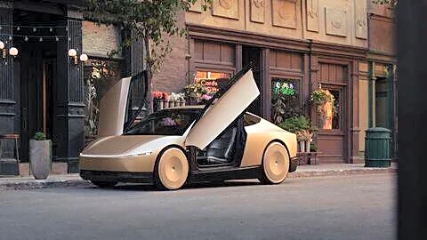 Tesla unveils Cybercab 2-seater robotaxi without steering wheel or pedals