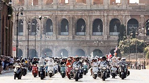 Rome marks Vespa's 80th anniversary with 25,000 scooters parade