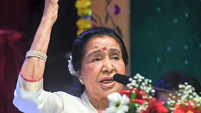 How much will Asha Bhosle's son Anand inherit?