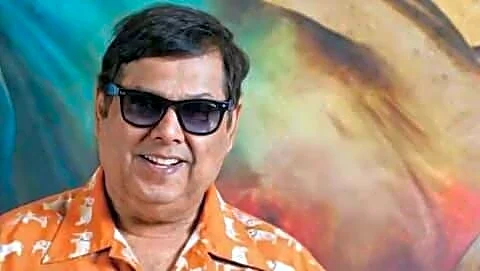 Director Dhawan says packed schedule prevented earlier teaming with Khan