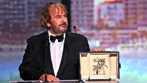Jackson receives honorary Palme d'Or from Wood at Cannes
