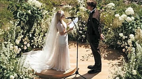 Roberts weds John in Sun Valley wearing silk and lace