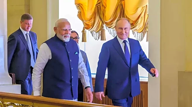 Putin receives Guard of Honor; he pays tribute to Gandhi