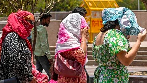 Northern and central India swelter while northeast drenched by storms