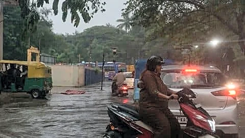 Heavy rain floods Bengaluru, triggers traffic jams and flight delays