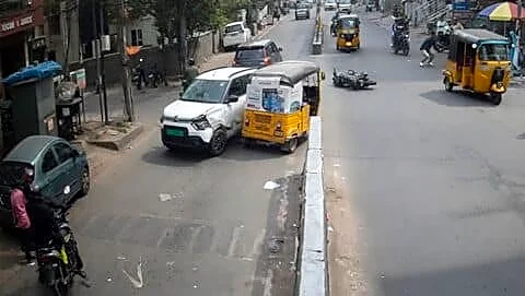 High-speed electric car crashes into Kukatpally tiffin center, injures motorcyclist