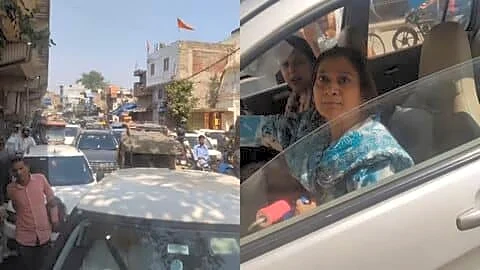 Delhi video shows woman blocking truck after wrong-side parking