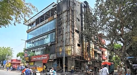 Krishna Market Kalkaji fire after 3 cooking gas cylinders explode