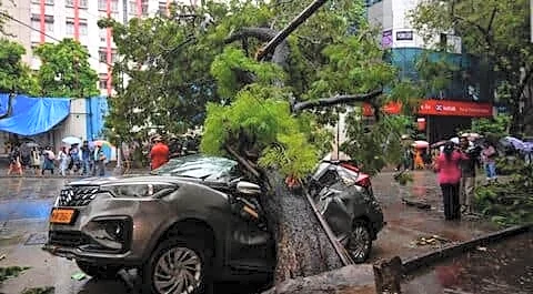 Two weeks late, Mumbai monsoon brings heavy rain, floods, protests