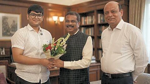Union Education Minister Pradhan meets NEET AIR 2 Panshul Bansal