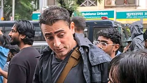Actor Khan joins Mumbai protest for education reforms despite rain