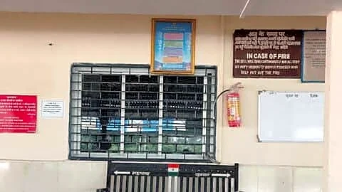 Navapur railway station straddles Gujarat and Maharashtra with painted border