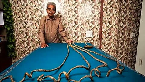 Shridhar Chillal in Pune holds Guinness World fingernails record 909.6cm