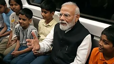 Narendra Modi rides Delhi Metro to address SRCC centenary gathering