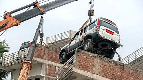 Manoj Yadav uses crane to park SUV on Gopalganj roof