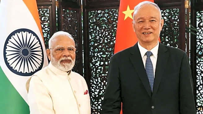 Who is Cai Qi, Xi Jinping's trusted aide, visiting India?