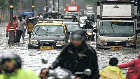 Mumbai heavy rain floods streets and diverts 11 incoming flights