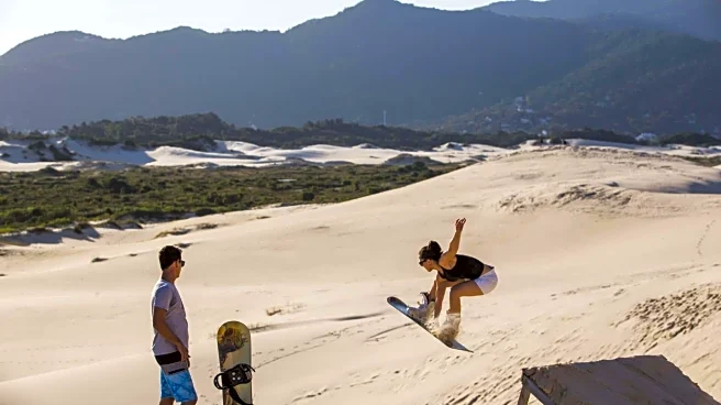 Planning Praia do Norte trip? Include sandboarding on these dunes