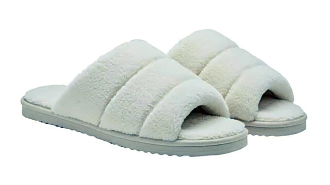 Shearling-lined slides: The winter footwear you need