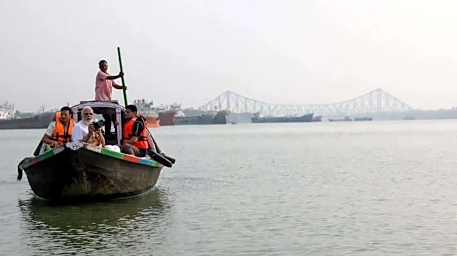 Modi takes Hooghly boat ride, pays tribute to 'Maa Ganga'