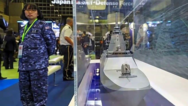 Japan scraps postwar arms export limits, opens global weapons market