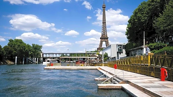 Man arrested after climbing Eiffel Tower to hang US flag