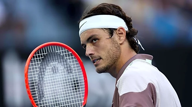 Australian Open: Taylor Fritz survives Royer scare, reaches second round