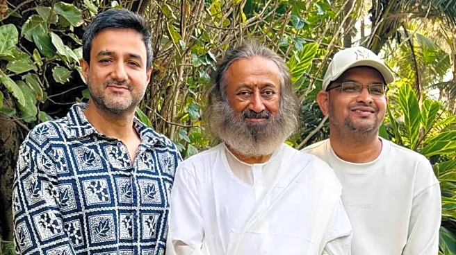 Siddharth Anand Meets Sri Sri Ravi Shankar Amid Biopic White's Shoot: Film Is Need Of The Hour
