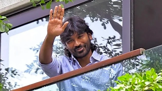 Dhanush Celebrates 43rd Birthday With Fans Gathered Outside Pose Garden Residence; Cuts Cake - PICS