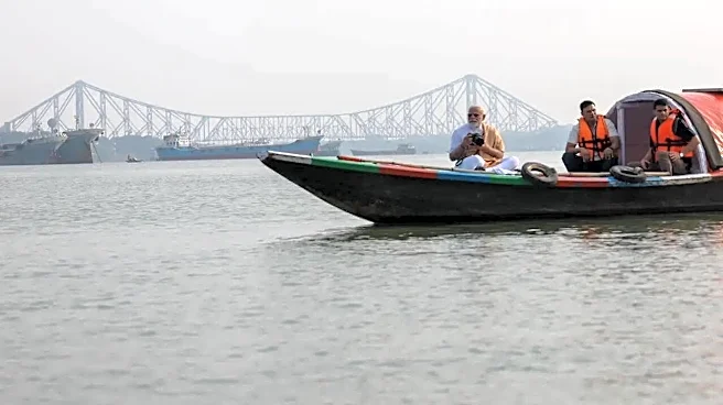 PM Modi's Boat Ride on Hooghly River Amid Election Rush - Watch