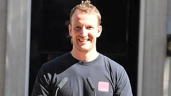 Meet The Only Constant in British Politics: “Hot Podium Guy”