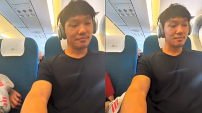 Internet Hails Man As Video Shows Him Calmly Enduring Young Co-Passenger’s Kicks & Screams On Flight