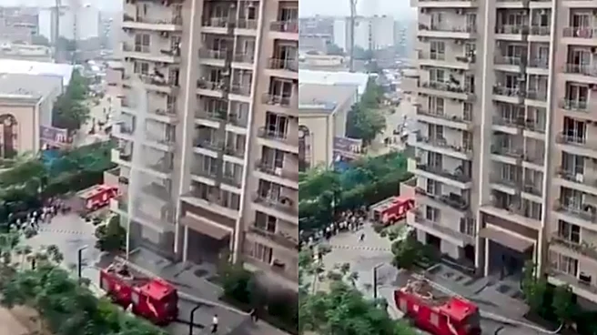 Noida Building’s 12th Floor Continues To Burn While Fire Tender Sprays Water On 6th Floor