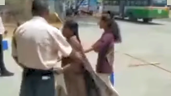 NEET Student’s Mother Falls At Guard’s Feet Over Exam Centre Entry Denial In Telangana