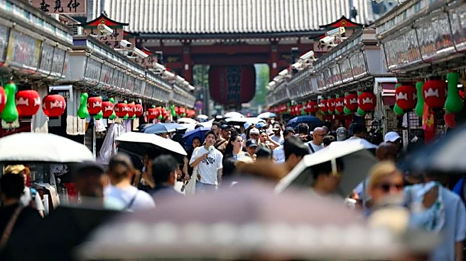景気判断「緩やかに回復」維持、中東情勢引き続き注視＝7月月例報告