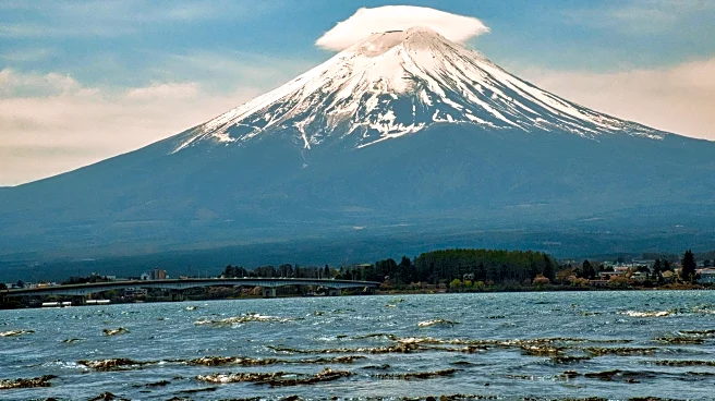 First Snow Of The Season Dusts Japan’s Iconic Mount Fuji