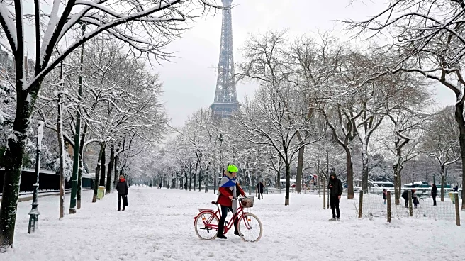 Paris Becomes A Snow Globe As Winter Weather Arrives