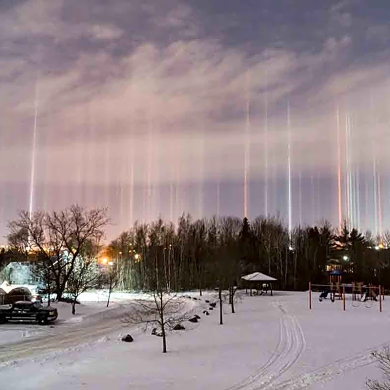 Minnesota Skies Glow With Rare Light Pillars During Cold Snap