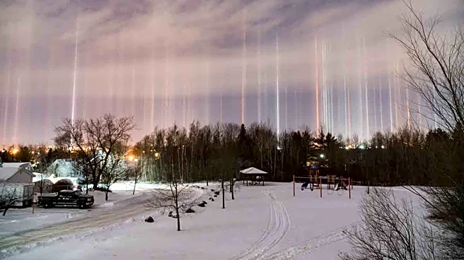 Minnesota Skies Glow With Rare Light Pillars During Cold Snap
