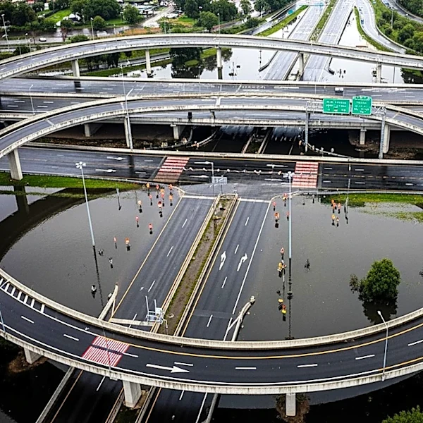 Flooding in Milwaukee Causes Highway Closures and Vehicle Traps